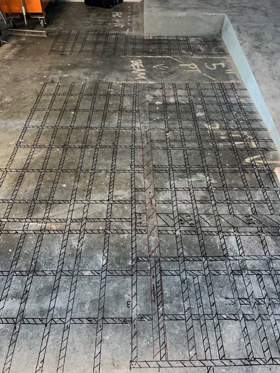 GPR rebar grid chalk markings on concrete slab - Nashville Yards