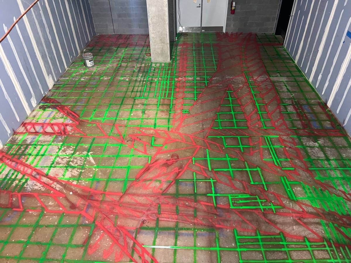 Rebar and post-tension chalk markings on concrete slab - The Gulch Nashville